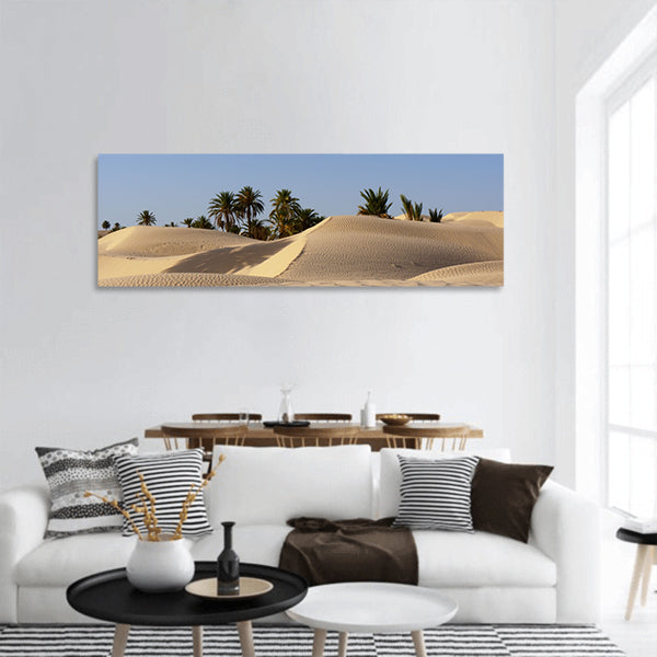 Sand dune and palm tree in the desert panoramic canvas wall art