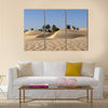 sand dune and palm tree in the desert Multi panel canvas wall art