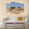 sand dune and palm tree in the desert Multi panel canvas wall art