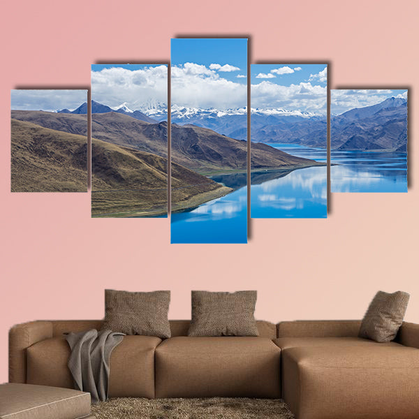 Yamdrok lake highest land with mountains under blue sky canvas wall art