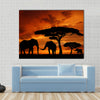 Silhouette two elephants in the sunset Multi panel canvas wall art