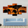 Silhouette two elephants in the sunset Multi panel canvas wall art