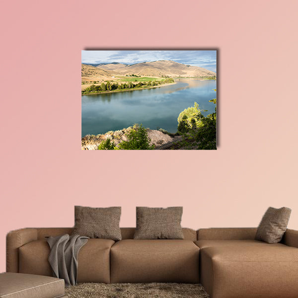 Railroad tracks running along scenic and Flathead River wall art