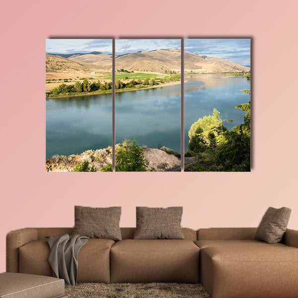 Railroad tracks running along scenic and Flathead River wall art