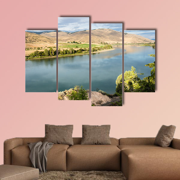 Railroad tracks running along scenic and Flathead River wall art