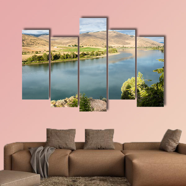 Railroad tracks running along scenic and Flathead River wall art