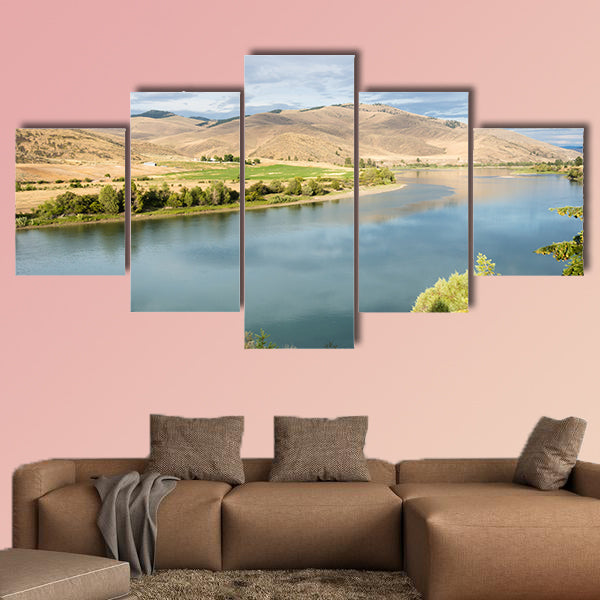 Railroad tracks running along scenic and Flathead River wall art