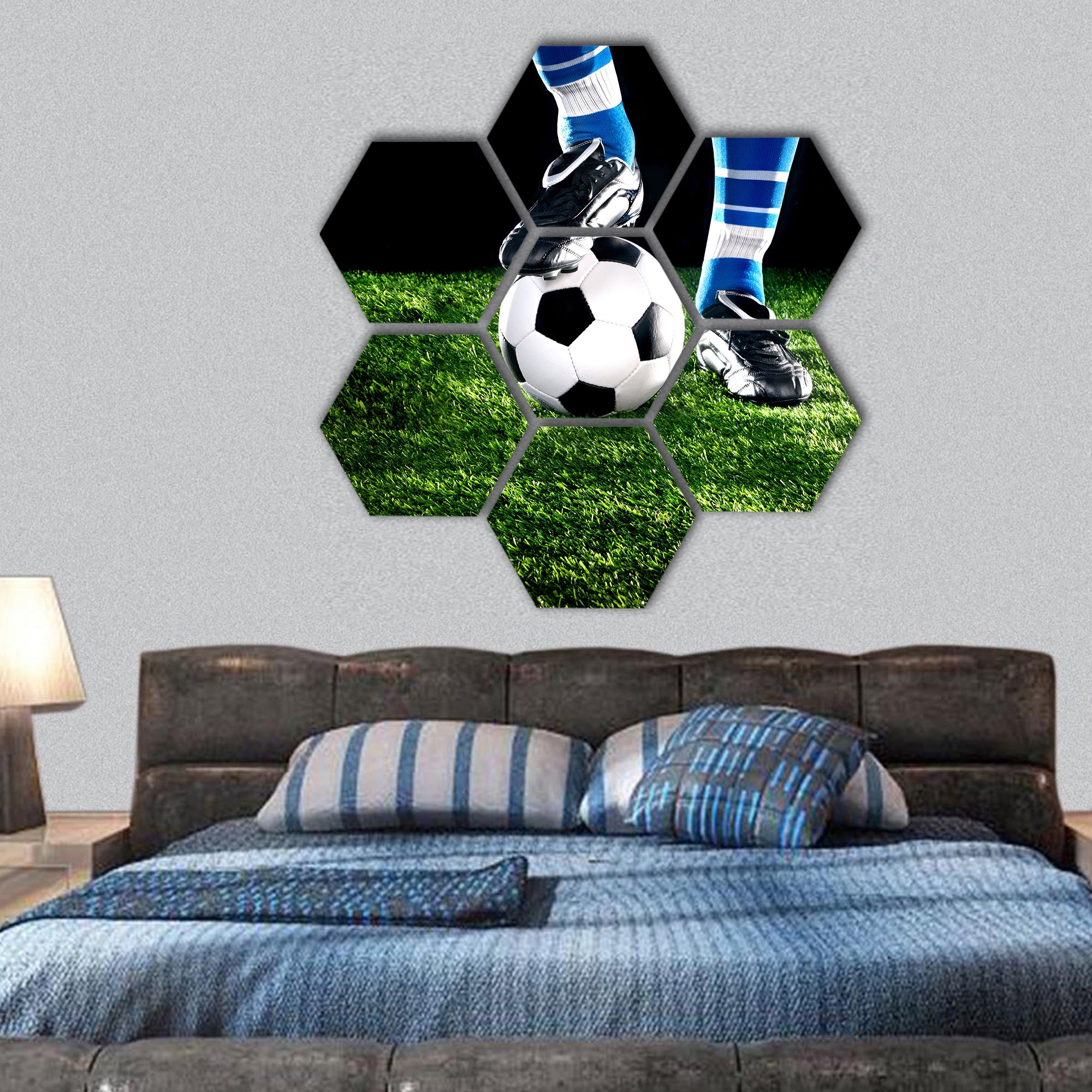 soccer ball with his feet on the football field hexagonal canvas wall art