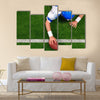 Photo of an American football player making a one handed touchdown Multi panel canvas wall art