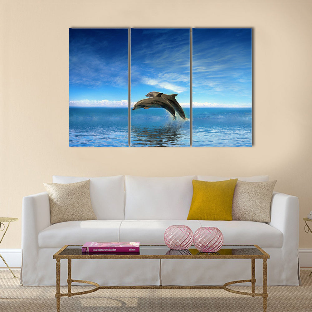 Two Beautiful Dolphins jumping on sea multi panel canvas wall art