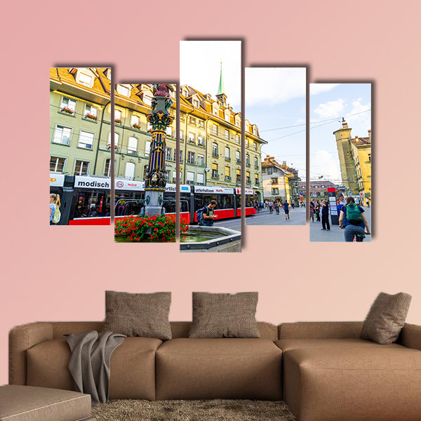People on the shopping alley with the Zytglogge astronomical clock tower wall art