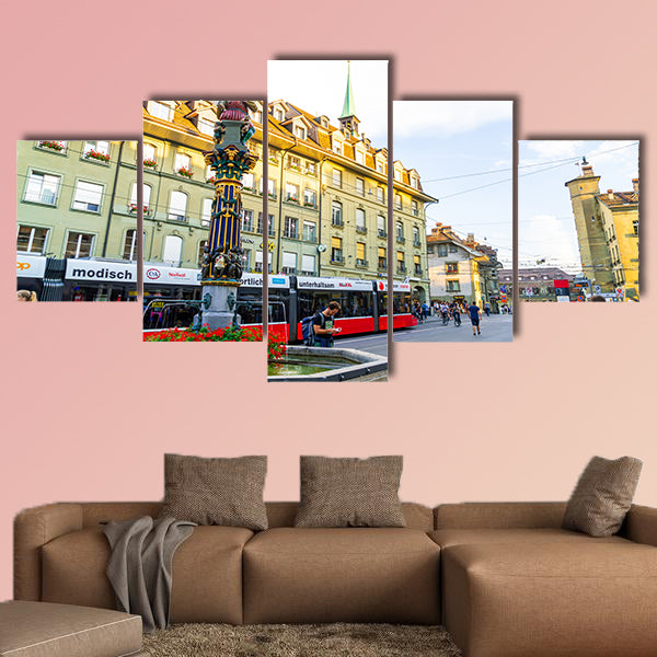 People on the shopping alley with the Zytglogge astronomical clock tower wall art