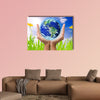 Hand holding earth, saving earth concept, multi panel canvas wall art