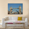 The open tower bridge over the river thames in London in England Multi panel canvas wall art