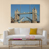 The open tower bridge over the river thames in London in England Multi panel canvas wall art