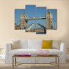 The open tower bridge over the river thames in London in England Multi panel canvas wall art