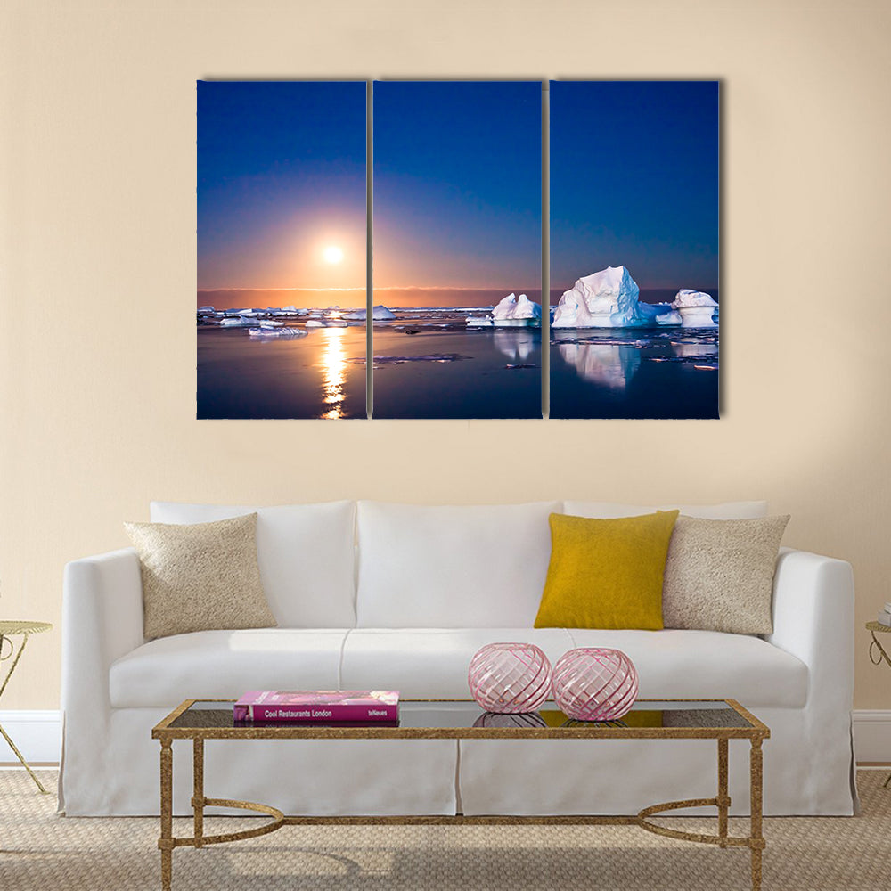 beautiful night in Antarctica. icebergs floating in the moonlight multi panel canvas wall art