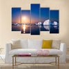 beautiful night in Antarctica. icebergs floating in the moonlight multi panel canvas wall art