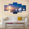 beautiful night in Antarctica. icebergs floating in the moonlight multi panel canvas wall art