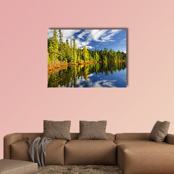 Beautiful forest reflecting on calm lake shore at Algonquin Park wall art