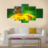 Blue butterfly on yellow flower Multi Panel Canvas Wall Art