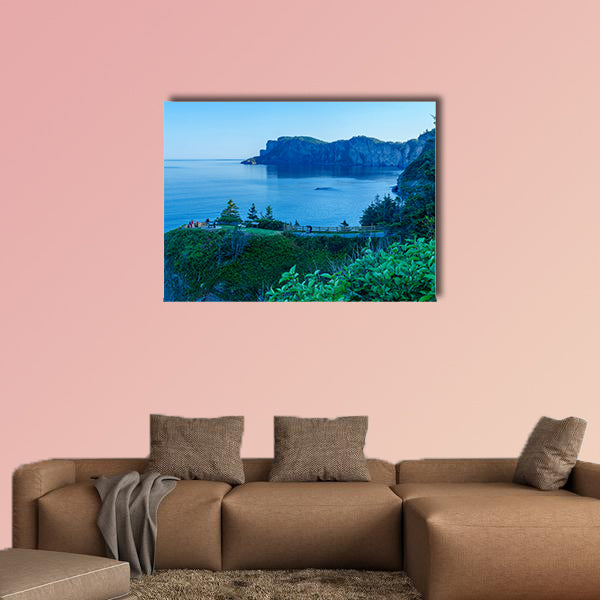 Landscape of cliffs and ocean in Cap-Bon-Ami, with visitors, wall art