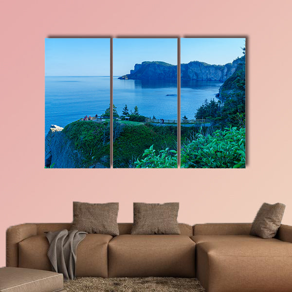 Landscape of cliffs and ocean in Cap-Bon-Ami, with visitors, wall art