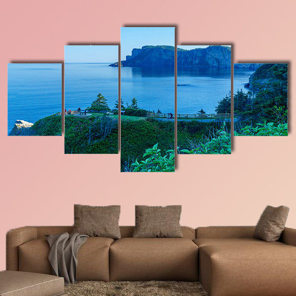 Landscape of cliffs and ocean in Cap-Bon-Ami, with visitors, wall art