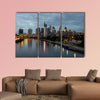 City lights of the Philadelphia skyline at nighttime multi panel canvas wall art