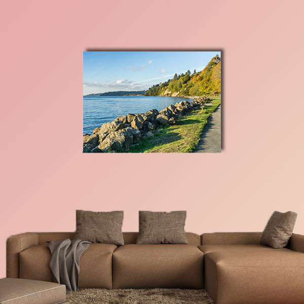 A view of the rocky shoreline at Saltwater State Park in the autumn multi panel canvas wall art