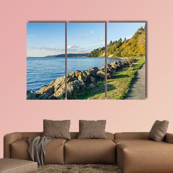 A view of the rocky shoreline at Saltwater State Park in the autumn multi panel canvas wall art