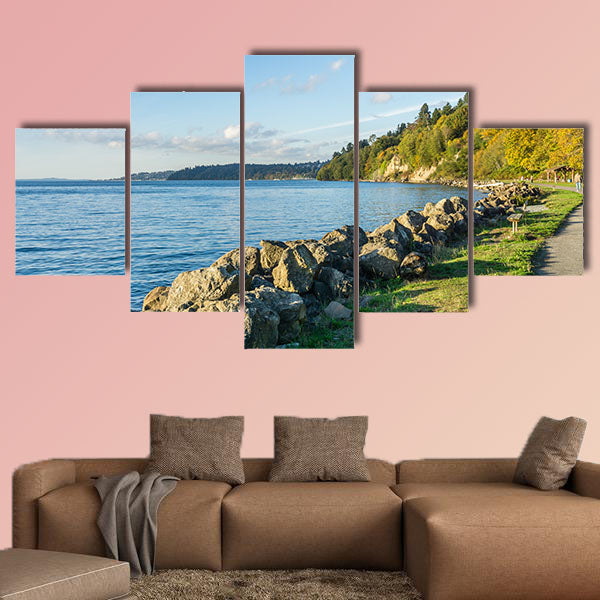 A view of the rocky shoreline at Saltwater State Park in the autumn multi panel canvas wall art