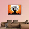 Illustration of a Halloween frightening wicked tree with evil eyes, graveyard, multi panel canvas wall art