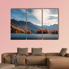 Picturesque view on autumn lake in Swiss Alps. Colorful forest wall art