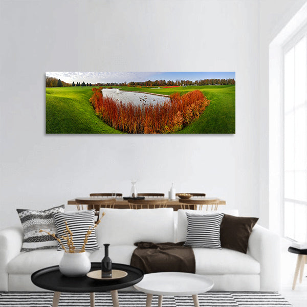 Quiet pond and green meadow in autumn park panoramic canvas wall art