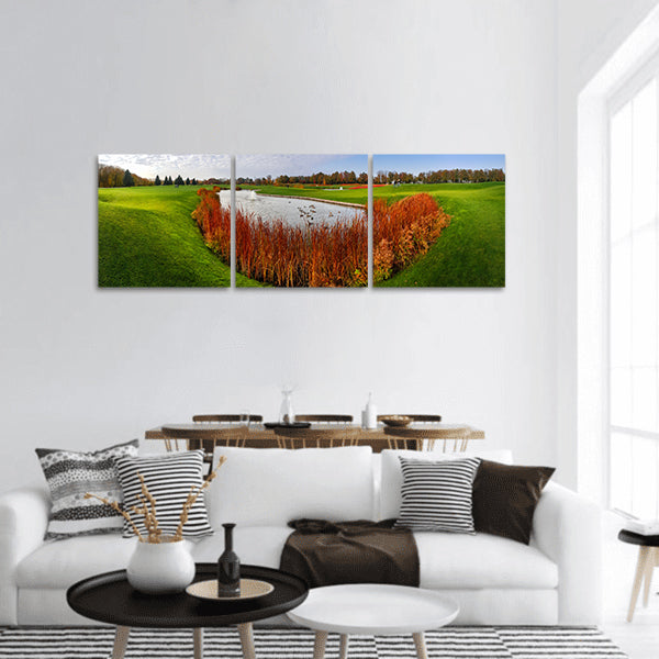 Quiet pond and green meadow in autumn park panoramic canvas wall art