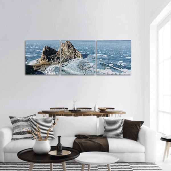 Rock formations on lake shore over water and hills Russia, Lake Baikal panoramic canvas wall art