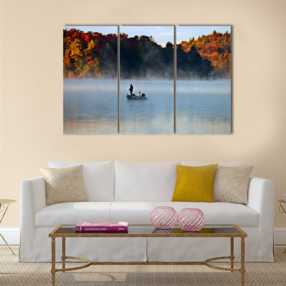 Silhouette of a man fishing in the morning fog with autumn colors multi panel canvas wall art
