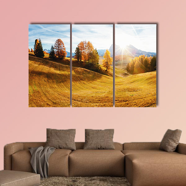 Magic image of larchs on the slopes of bright hills multi panel canvas wall art