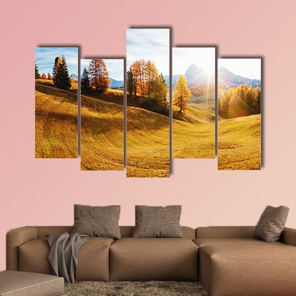 Magic image of larchs on the slopes of bright hills multi panel canvas wall art