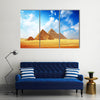 Giza valley with Great pyramids with blue cloudy sky Multi Panel Canvas Wall Art