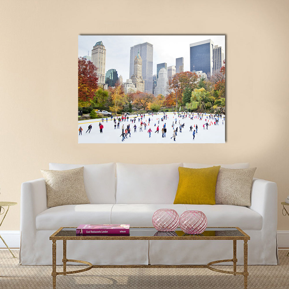 Ice skaters having fun in New York Central Park in fall Multi panel canvas wall art