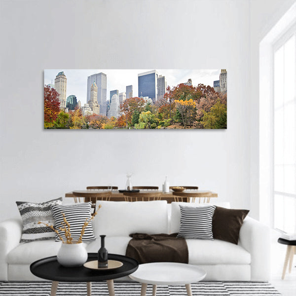 Ice skaters having fun in New York Central Park in fall panoramic canvas wall art