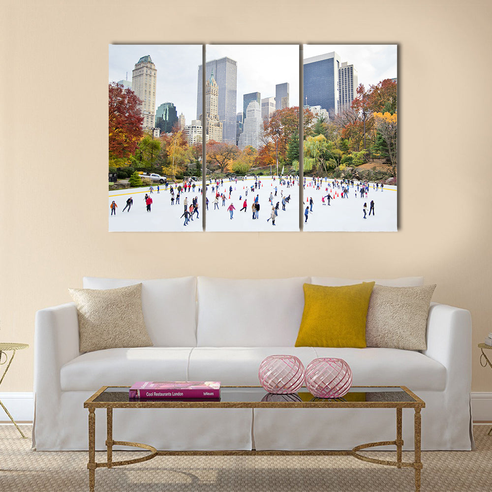 Ice skaters having fun in New York Central Park in fall Multi panel canvas wall art