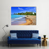 Jamaica. A national boat on sandy coast of a bay Multi panel canvas wall art