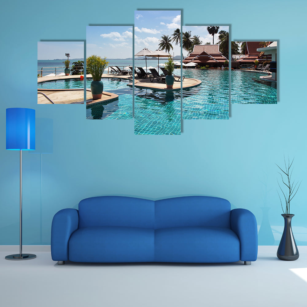 Tropical resort, a Poolside with beautiful sea view, multi panel canvas wall art