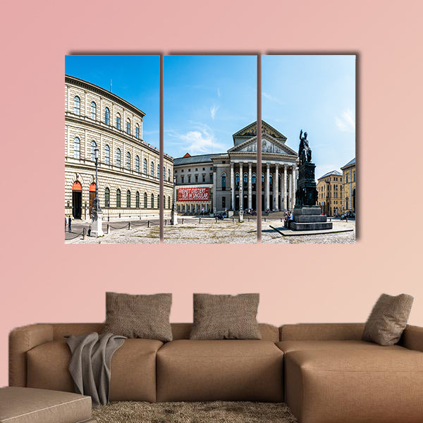 The famous historic residing theatre and the statue of wall art