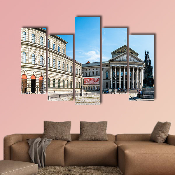 The famous historic residing theatre and the statue of wall art