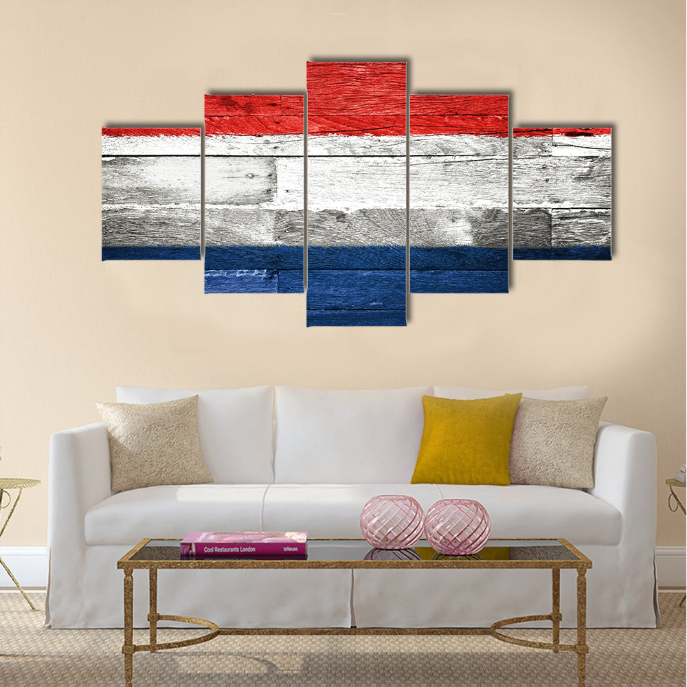 netherlands flag painted on old wood background Multi panel canvas wall art