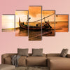 Local boat on the beach at sunset time, Bali, Indonesia multi panel canvas wall art